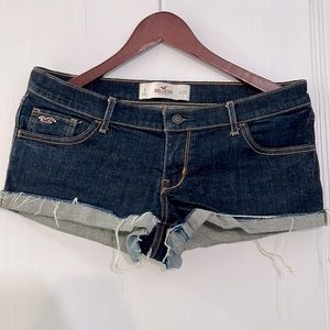 Hollister classic denim shorts size 9, dark wash, zipper, cuffed hem.